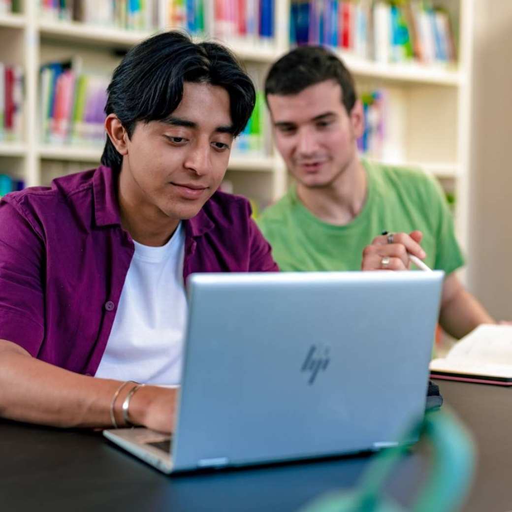 International students Diego and Andrei studying at the library on the Arnhem campus of HAN University of Applied Sciences.