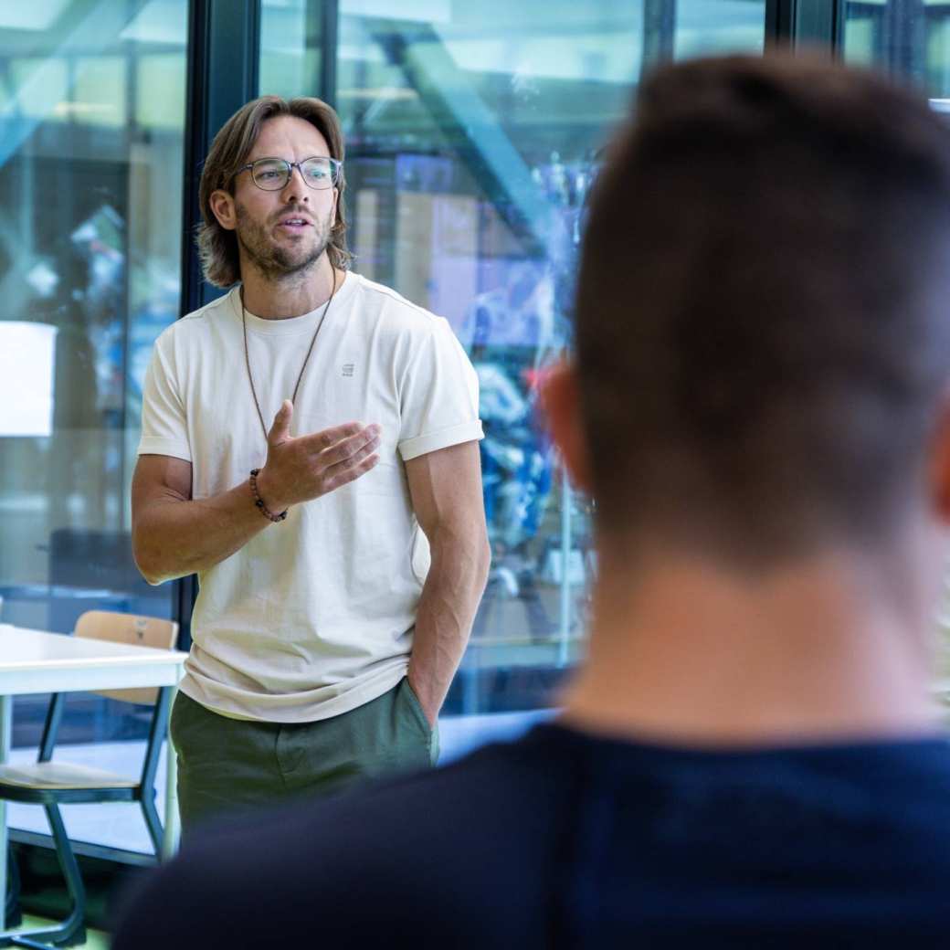 Student in Applied Data Science gives a presentation in class.