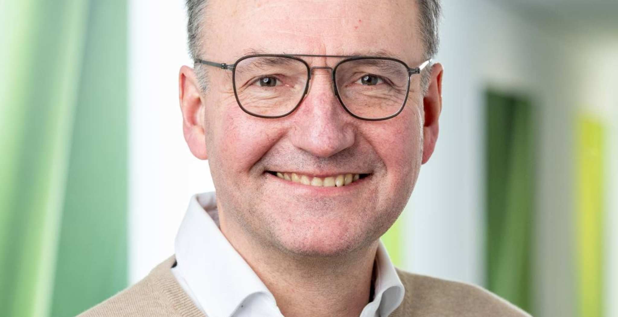 Portretfoto van docentonderzoeker en Kenniskringlid Ger Sluman.